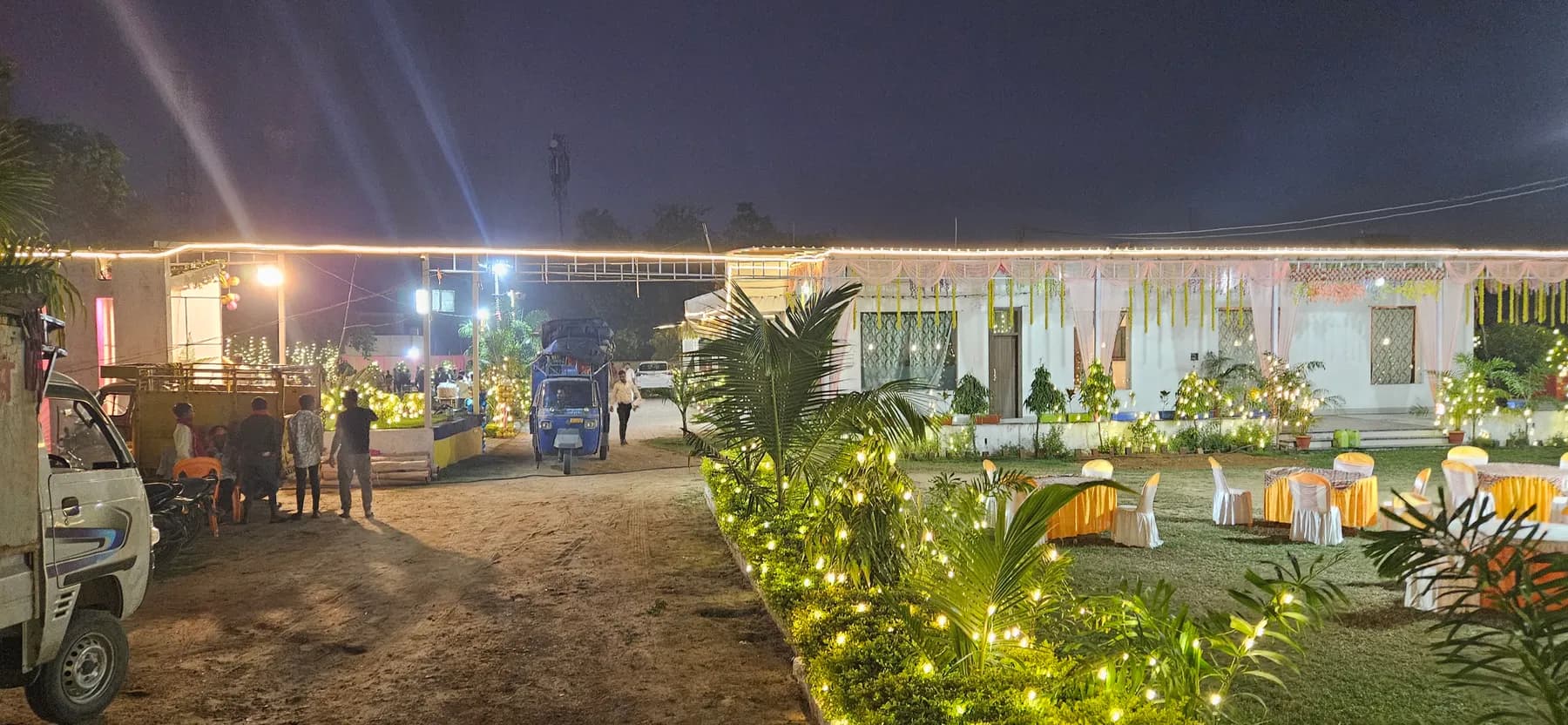 Bandhan Marriage Hall venue exterior lit up at night