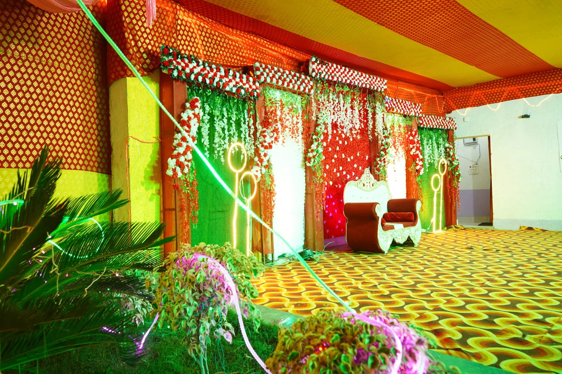 Decorated wedding stage and mandap at Bandhan Marriage Hall